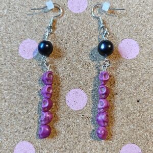Black fresh water pearl and purple skull earrings